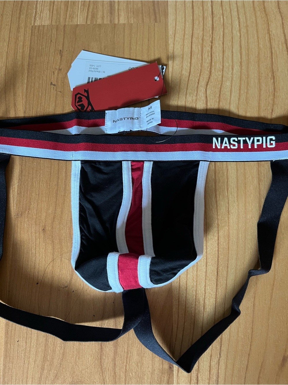 Nasty Pig Black Jockstrap with Red & White Striped Waistband